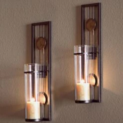 DANYA B Contemporary Metal Brown Wall Candle Sconces With Antique Patina Medallions (Set Of 2)